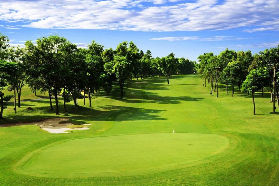 Vietnam Golf & Country Club West Course tree-lined fairway