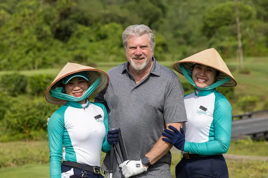 happy guest playing golf in vietnam